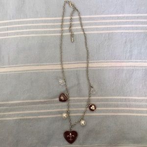 Necklace with charms and pearls